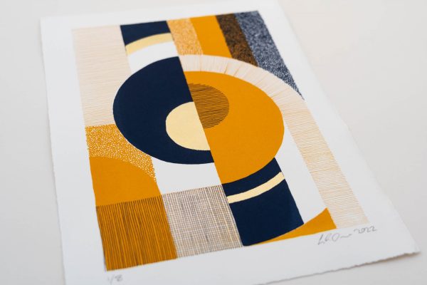 detailed shot of an abstract screen print with gold leaf